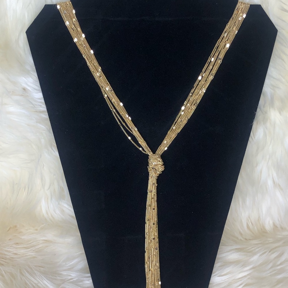 Long gold rope necklace